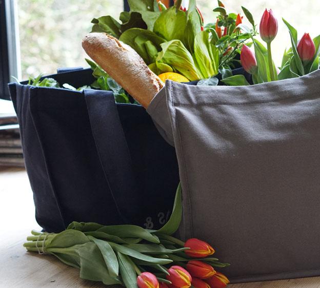 cloth grocery bags filled with food 